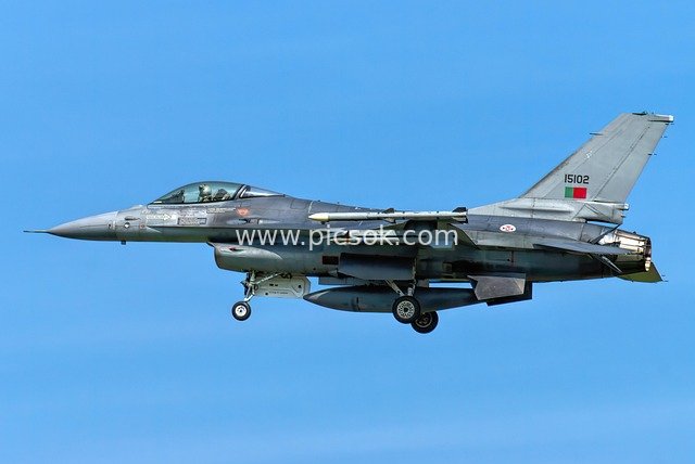 High-Resolution Image of Portuguese F-16 Fighter Jet Flying in Blue Sky