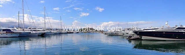 Mediterranean Luxury Yacht Marina - Resort Scene with Blue Sky and Clear Waters