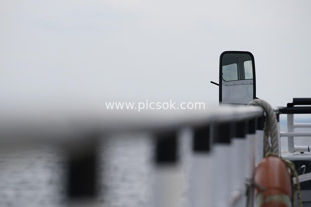 Ocean View from a Ship: Fuzzy Sky and Sea Reflected in the Ship's Side Mirror