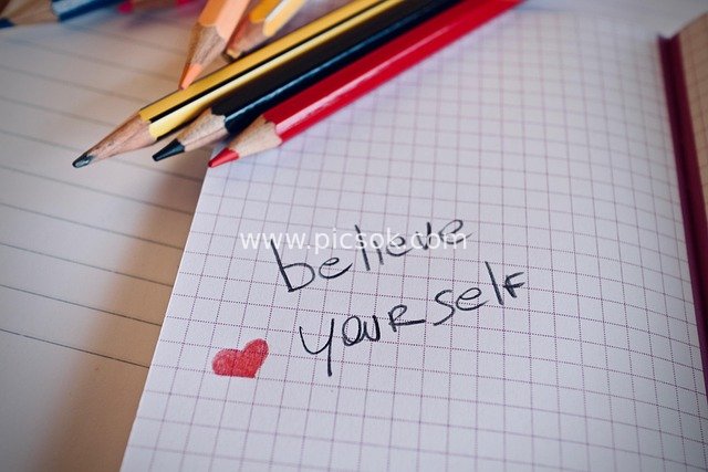 Inspirational Material: Handwritten 'Believe in Yourself' Notebook with Colored Pencils