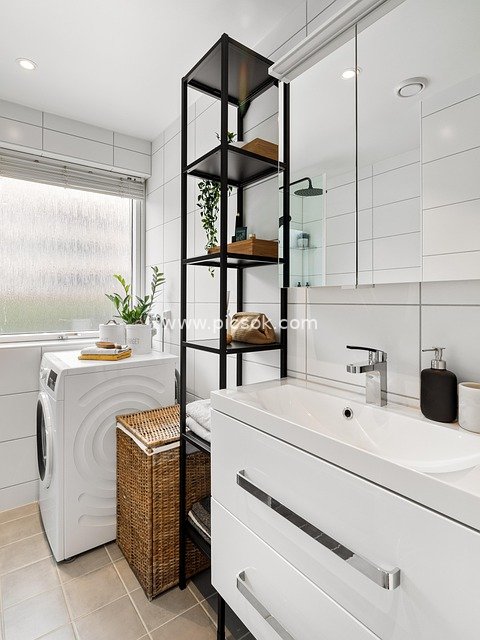 Modern Minimalist Bathroom Renovation: Washing Machine and Smart Storage Design