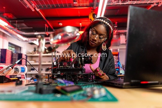 Female Engineer Focused on Electronic R&D in the Laboratory