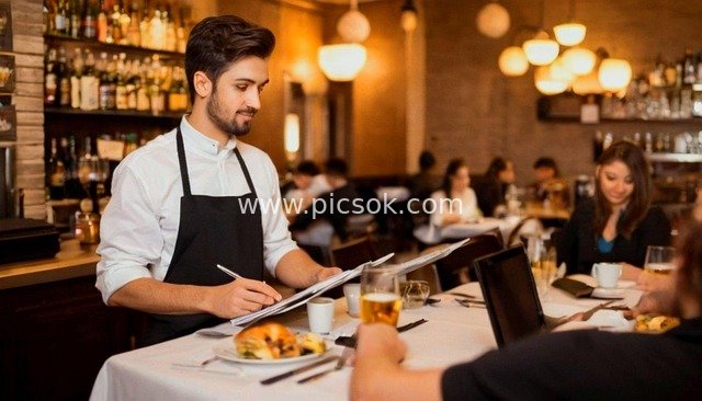 Business Work in a Restaurant: Real Shot of White-Collar Collaboration Scene