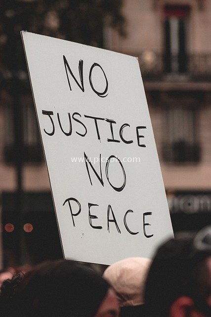 'No Justice No Peace' Protest Sign at Demonstration Scene