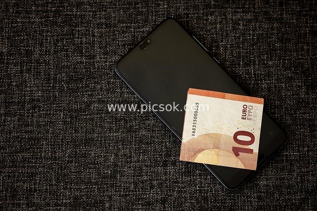 10 Euro Banknote on Black Smartphone - Financial Wealth Stock Material