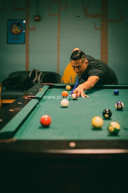 Billiards Enthusiast Focused on Playing 8-Ball in a Game Room