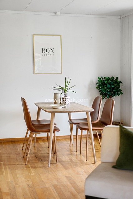 Minimalist Nordic-Style Dining Room with Wooden Table and Chairs Home Decor Image