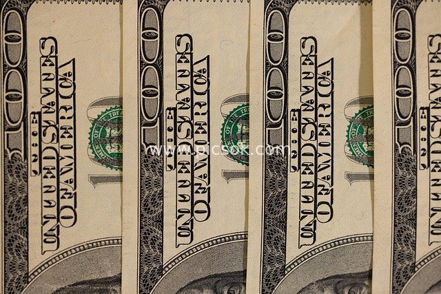 Close-up of Multiple US Dollar Bills - Financial Wealth & Cash Material