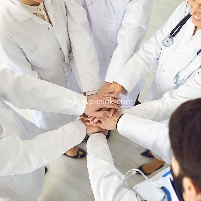 Medical Team Hand Stack Collaboration: Conceptual Image of Healthcare Unity & Wellness