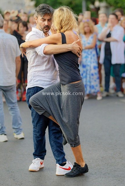 Couple Dancing on the Street: Vibrant Moment of Outdoor Dance Event