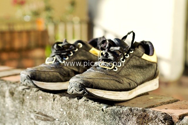 Close-Up of Stylish Black Textured Sneakers | Outdoor Casual Footwear