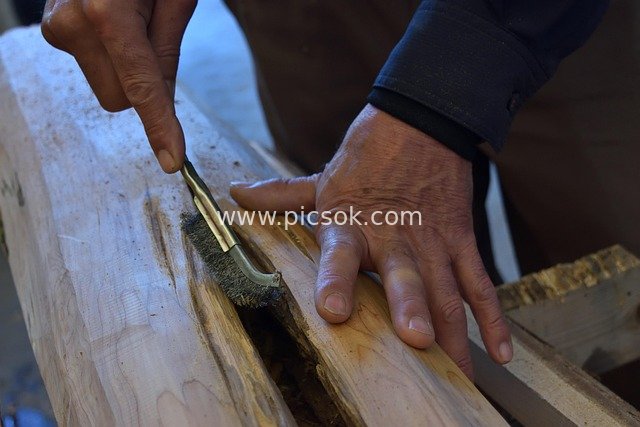 Woodworker Hand-Sanding Timber: Live Shot of Traditional Craftsmanship