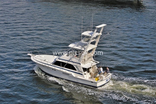 Luxury Deep-Sea Fishing Boat with Fishermen Fishing at Sea