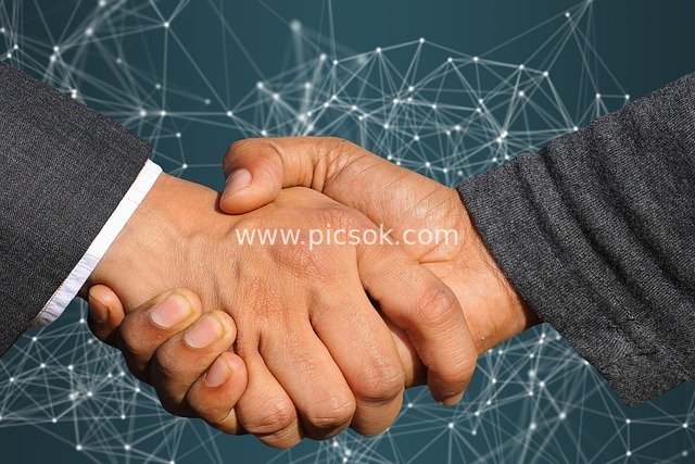 Business Handshake: Scene of Corporate Partnership Agreement Finalization