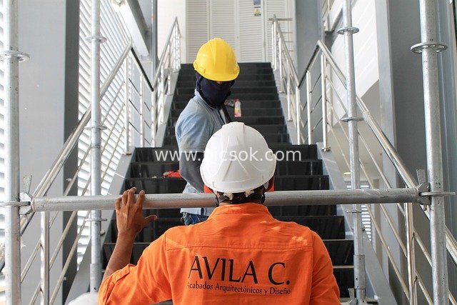 Real Scene Shot of Construction Workers Performing Safe Stair Construction