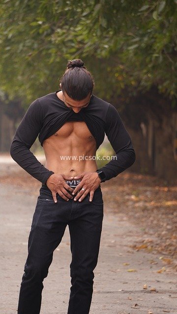 Outdoor Fitness Guy Displaying Six-Pack Abs | Muscular Physique Portrait