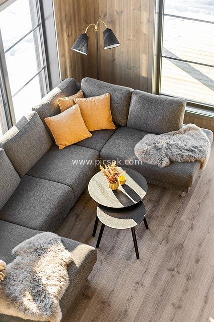 Cozy Modern Living Room with Gray L-shaped Sofa and Stylish Home Decor