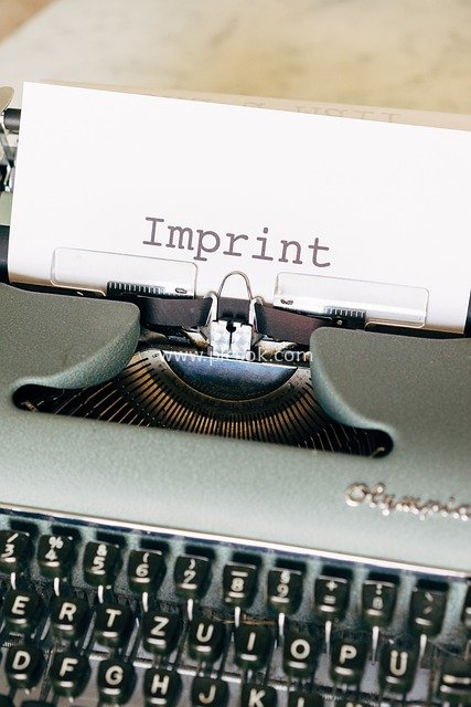 Vintage Typewriter Printing 'Imprint' – Nostalgic Business Messaging