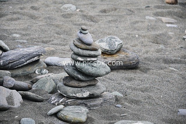 Coastal Beach Stone Stacking Art: A Serene Natural Wonder for Leisure Sightseeing