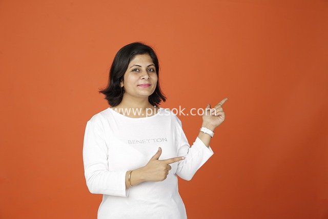 Creative Guidance for Professional Women | Business Portrait with Orange Background