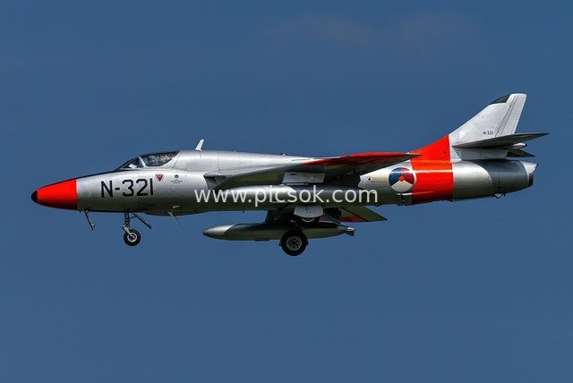 Hawker Hunter Jet Fighter High-Definition Image in Blue Sky Flight