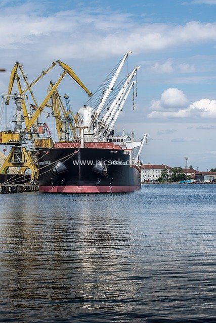 Cargo Ship Docked at Burgas Port with Port Cranes in Operation