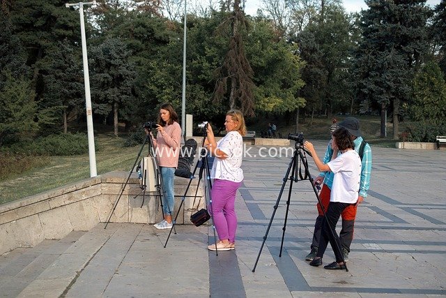 women, photographing, learning, course, teacher, tripods, outdoors, park, trees, people