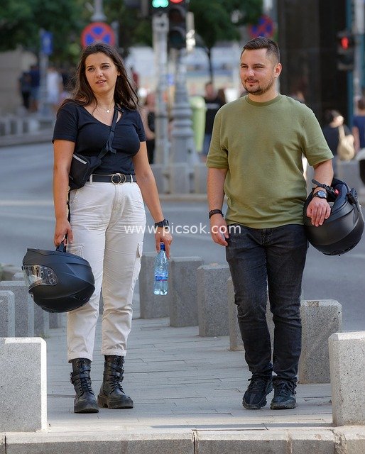 Casual Outing Moment of a Couple of Motorcyclists on City Streets