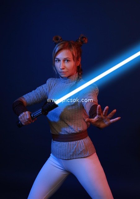 Star Wars Cosplay: Female Jedi Knight Lightsaber Battle Pose