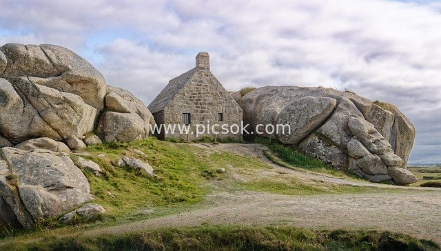 Stone Cottage and Giant Rock Landscape in Lead Ham, Brittany, France