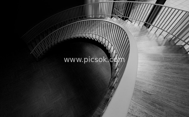 Black and White Spiral Staircase: Curved Design in Modern Architectural Interior