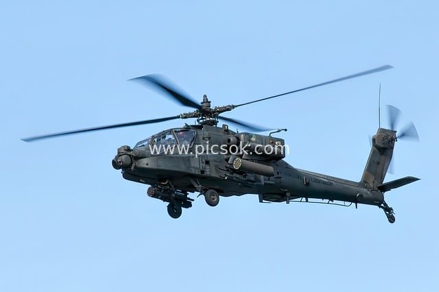 In-Action Shot of AH-64E Apache Attack Helicopter in Flight