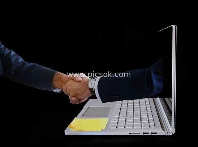 Scene of E-commerce Online Transaction and Business Handshake Collaboration