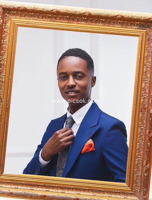 Formal Portrait of a Congolese Man with Golden Ornate Frame – Business Headshot