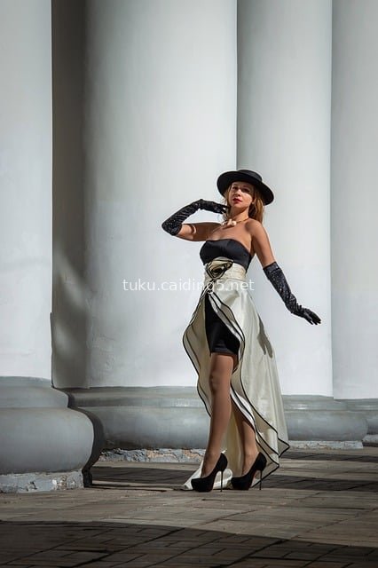 Elegant Fashion Portrait of a Stylish Woman in Front of a Classic White Columned Building
