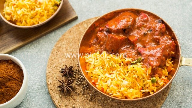 Indian Curry Yellow Rice – Tempting Delicacy Served in a Copper Bowl