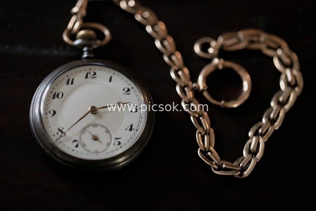 Vintage Pocket Watch with Silver Chain - Classic Timepiece Material