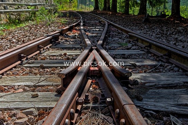 Close-Up of a Rusty Abandoned Railway Switch and Old Rail Scene