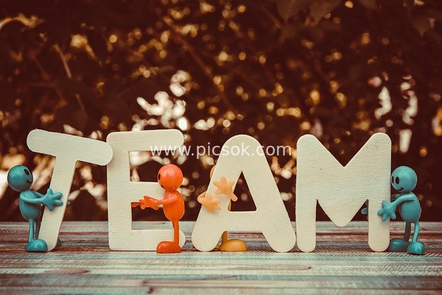 Team Collaboration Image Material: Creative Cartoon Figures Around TEAM Letters