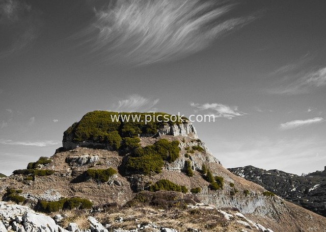 Lonely Peak & Natural Precipice: The Conquering Essence of Mountain Landscapes