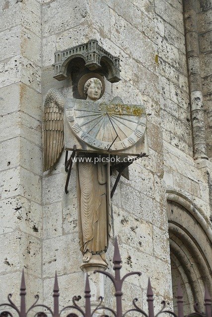 Angel Sundial Statue at Chartres Cathedral, France