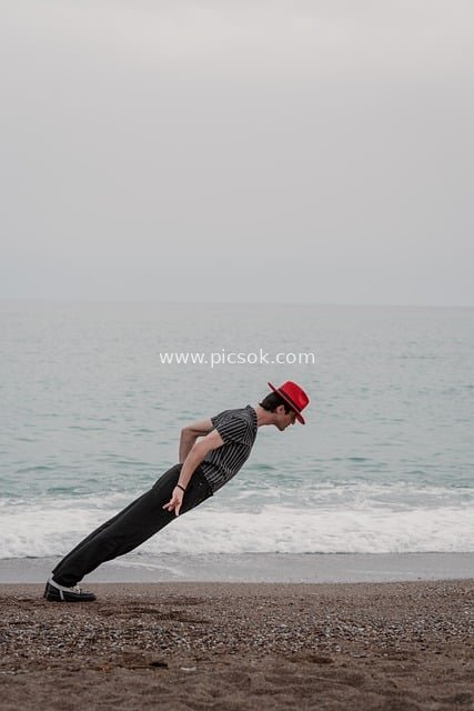 Beach Red Hat Optical Illusion Art: Modern Fashion Scene with Unique Pose
