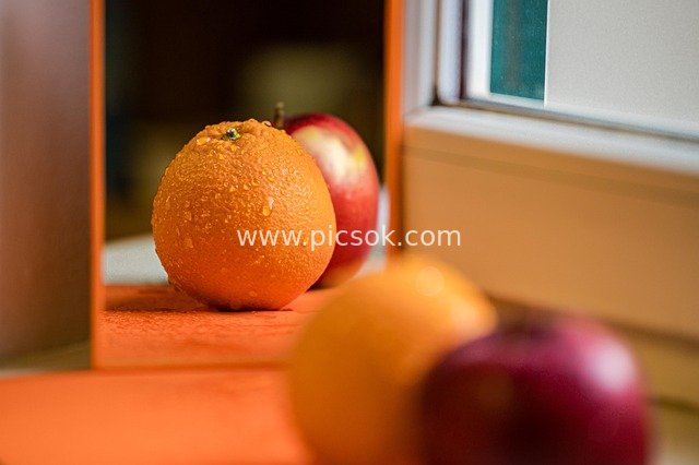 Fruit Still Life Before the Mirror: Reflective Art of Oranges and Apples