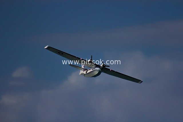 Consolidated PBY Catalina Seaplane Soaring in the Blue Sky – Classic Flying Boat Flight Scene