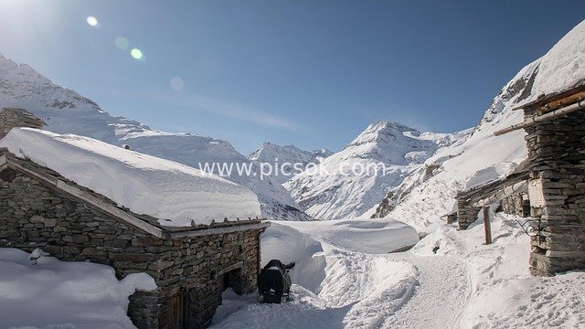 Alpine Stone Cottages After Snow - Stunning Winter Hiking Scenery in the High Mountains
