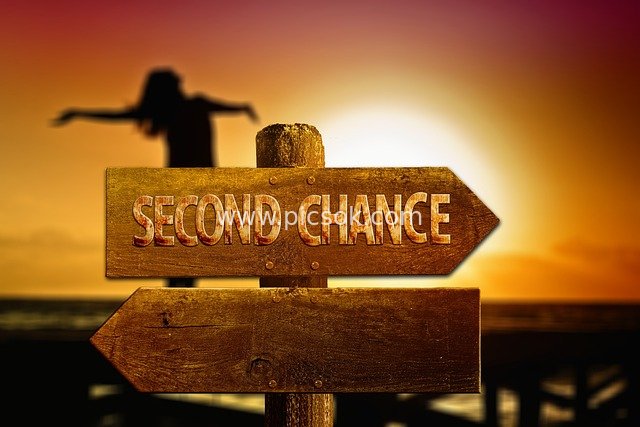Second Chance Wooden Road Sign: Life Choices at Sunset
