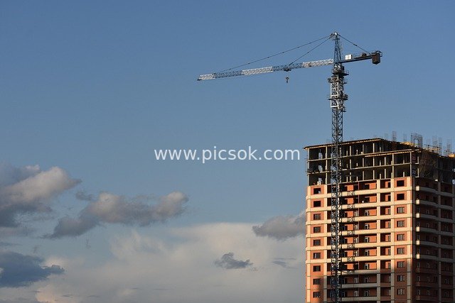Residential Construction in Novosibirsk: Tower Crane Contrasting with Blue Sky
