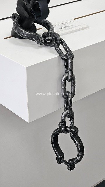 Large Rusty Chain and Handcuff Installation – Prison & Slavery Theme Display