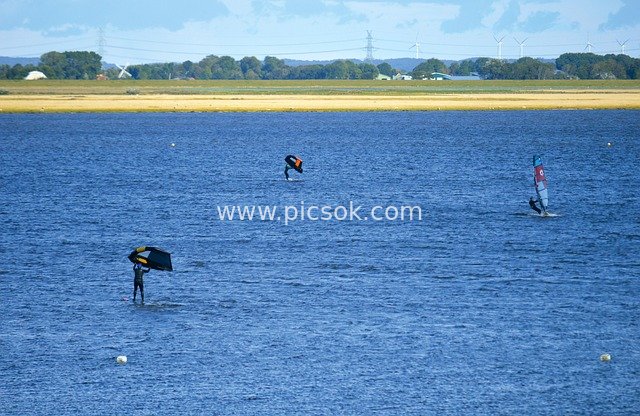Summer Water Sports: Vibrant Moments of Windsurfing and Kitesurfing