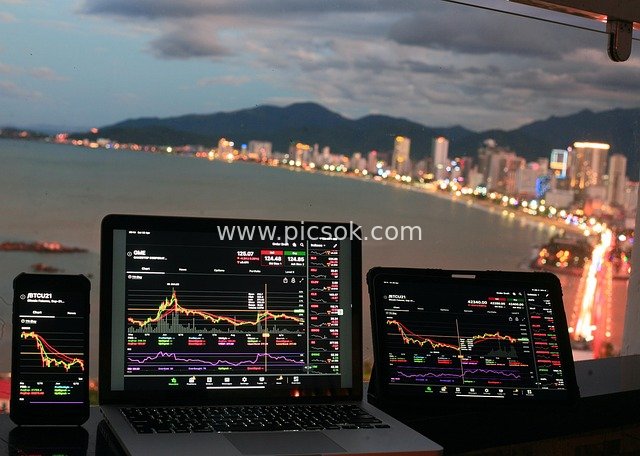 Combination of Digital Asset Trading Devices Under Seaside Night Scenery